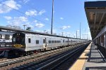 LIRR Train # 7923 with M7 Car # 7497 in the lead 